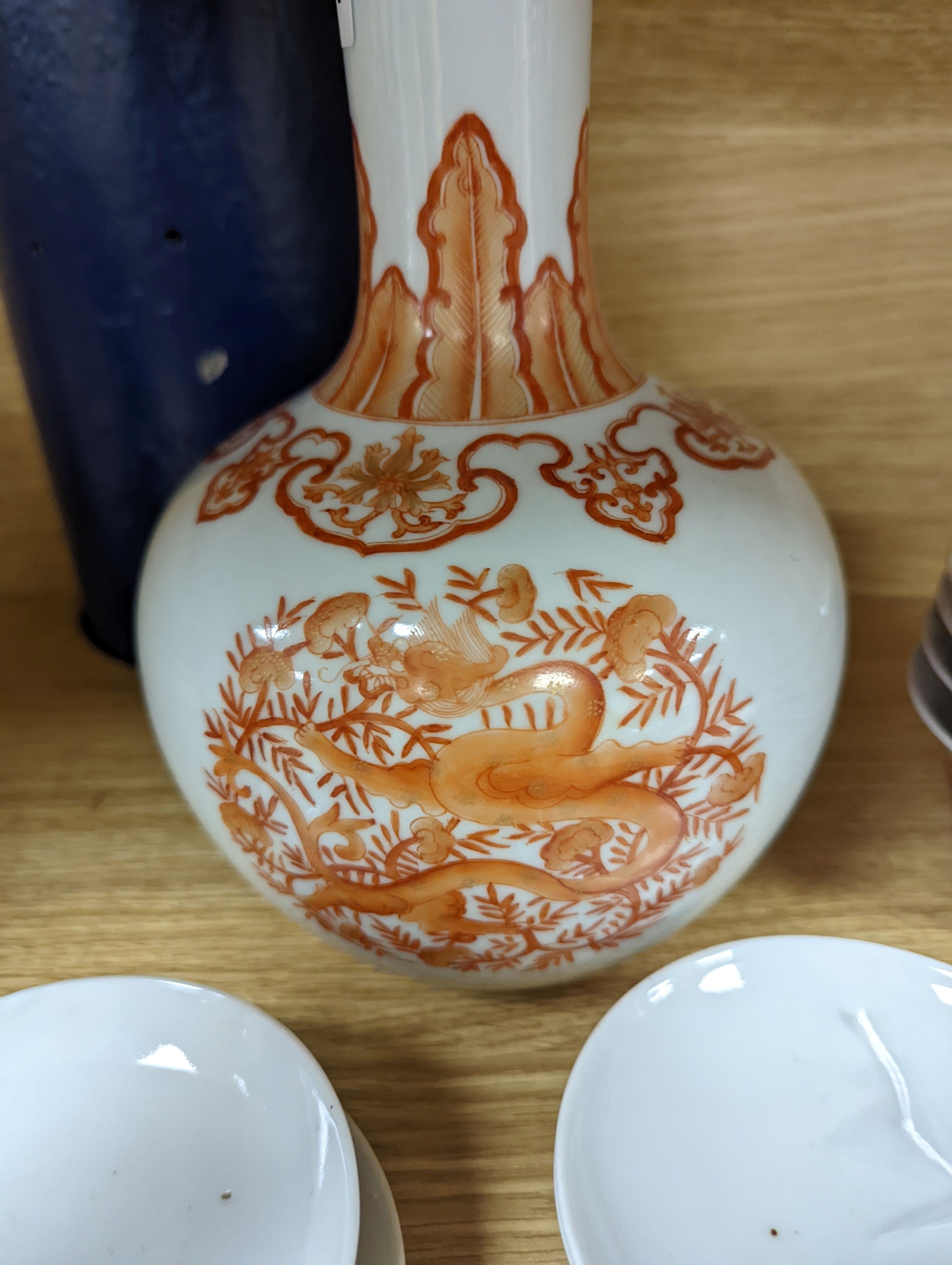 A set of five Chinese teabowls, covers and stands and a similar 'dragon' vase, 23cm